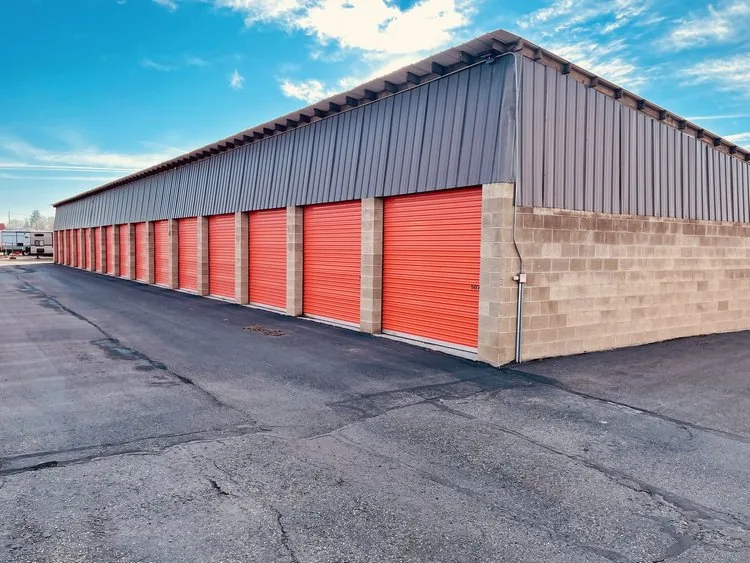Rows of drive-up self-storage units at a single-story storage facility